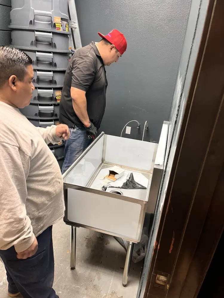 Commercial plumbing and sink installation in Schlichter